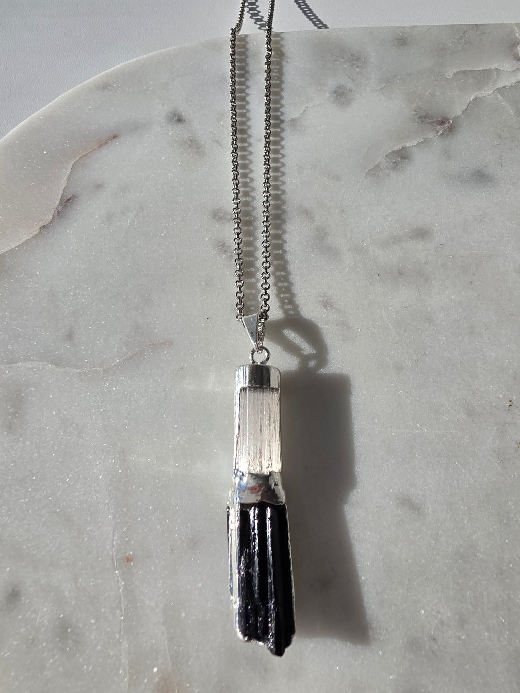Natural Selenite and Black Tourmaline crystal pendant in a refined Premium Silver Plated setting, Stone & Bloom Raw Luxe Collection