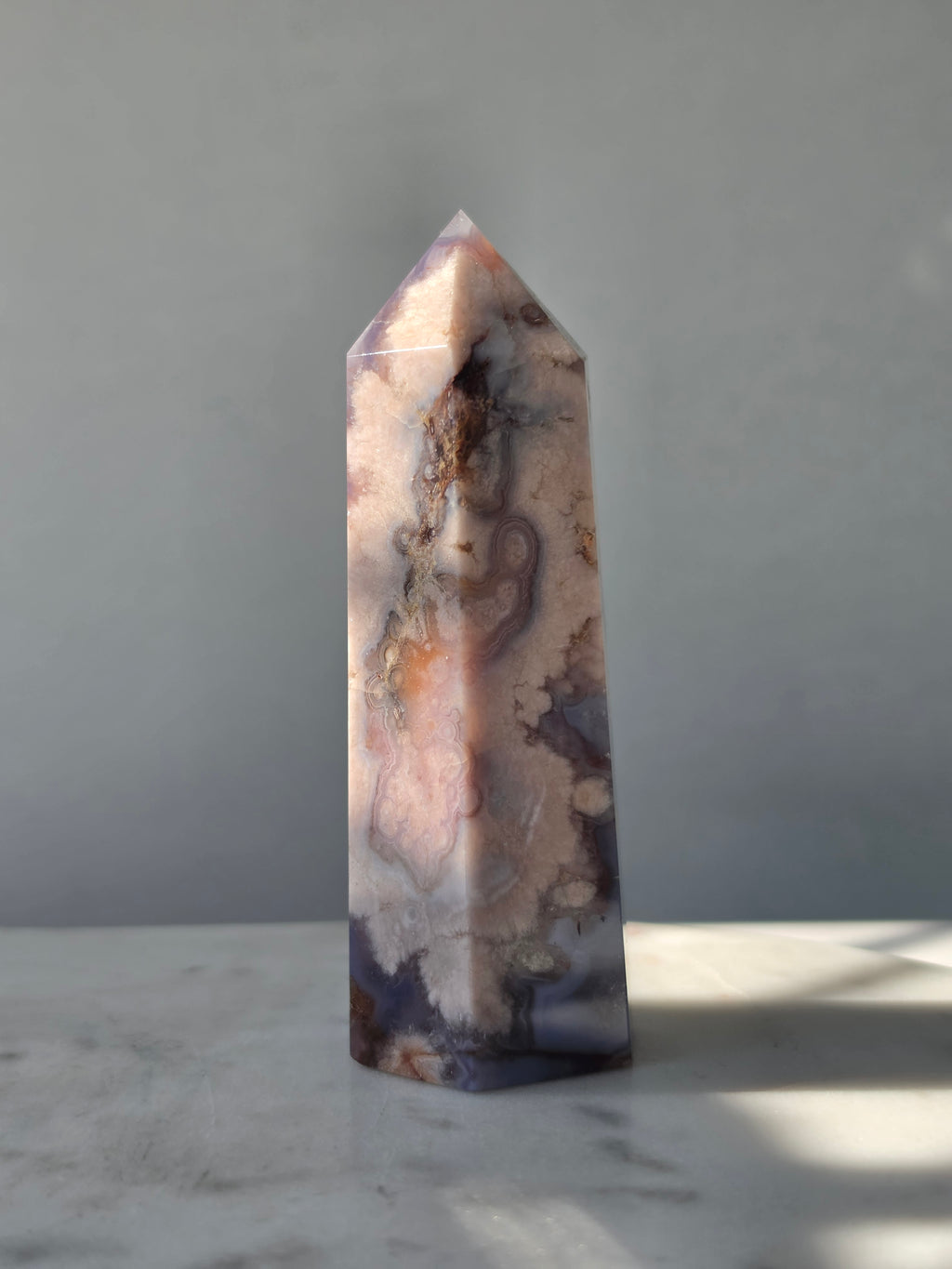 Blue Flower Agate crystal point with soft blue, lavender and cream tones and natural flower-like plume inclusions