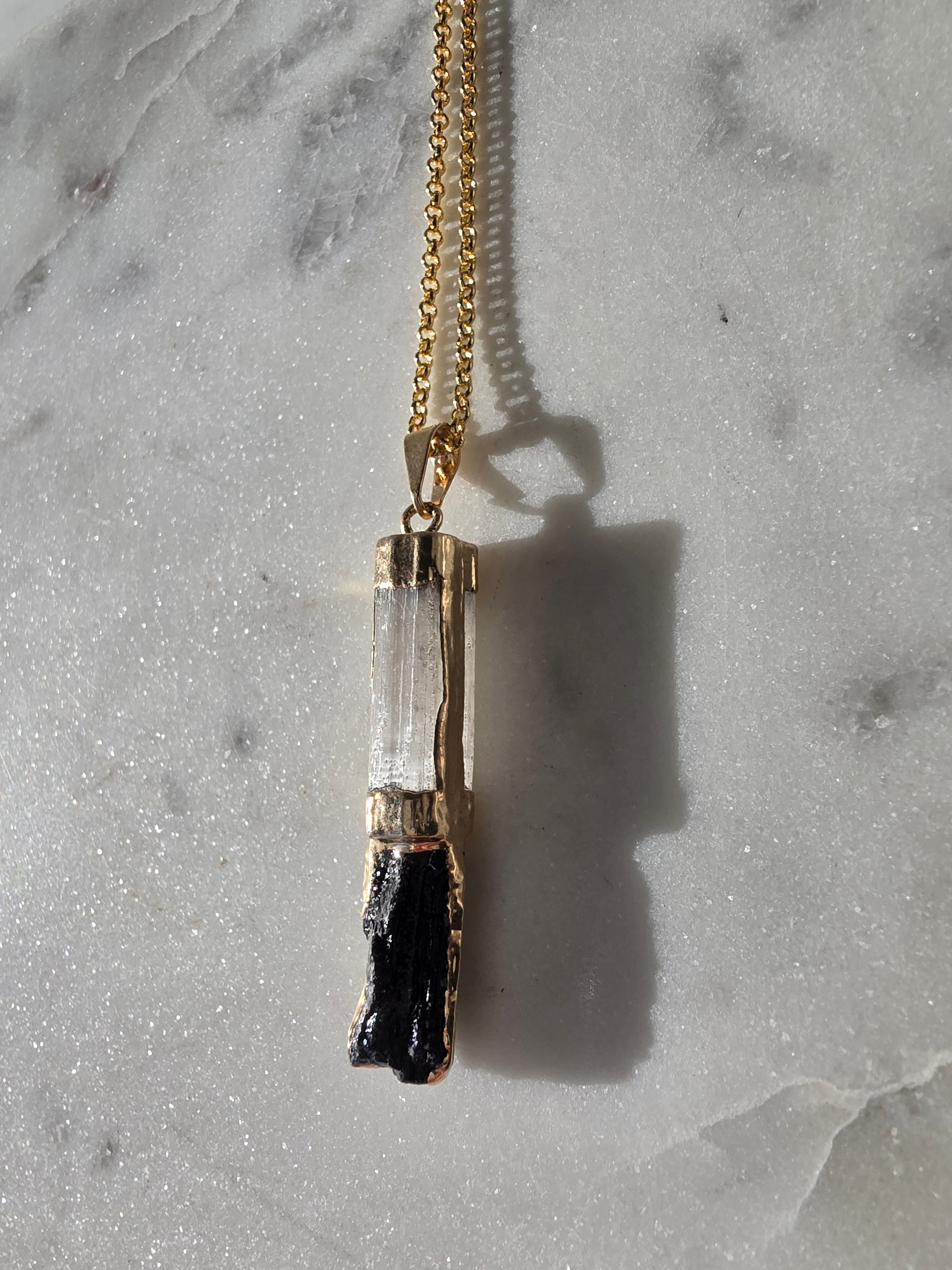 Natural Selenite and Black Tourmaline crystal pendant in a refined 24K Gold Plated setting, Stone & Bloom Raw Luxe Collection