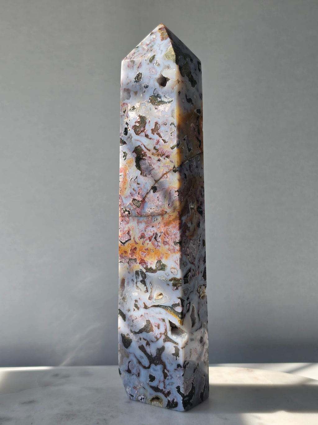 21.5cm Orbicular Ocean Jasper weighing 594g with translucent jelly-like pockets, sparkling druzy formations and intricate natural orbicular patterns