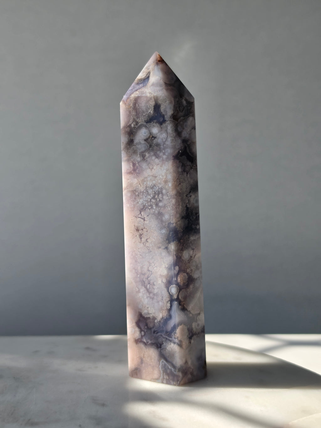 Blue Flower Agate crystal point with soft blue, lavender and cream tones and natural flower-like plume inclusions