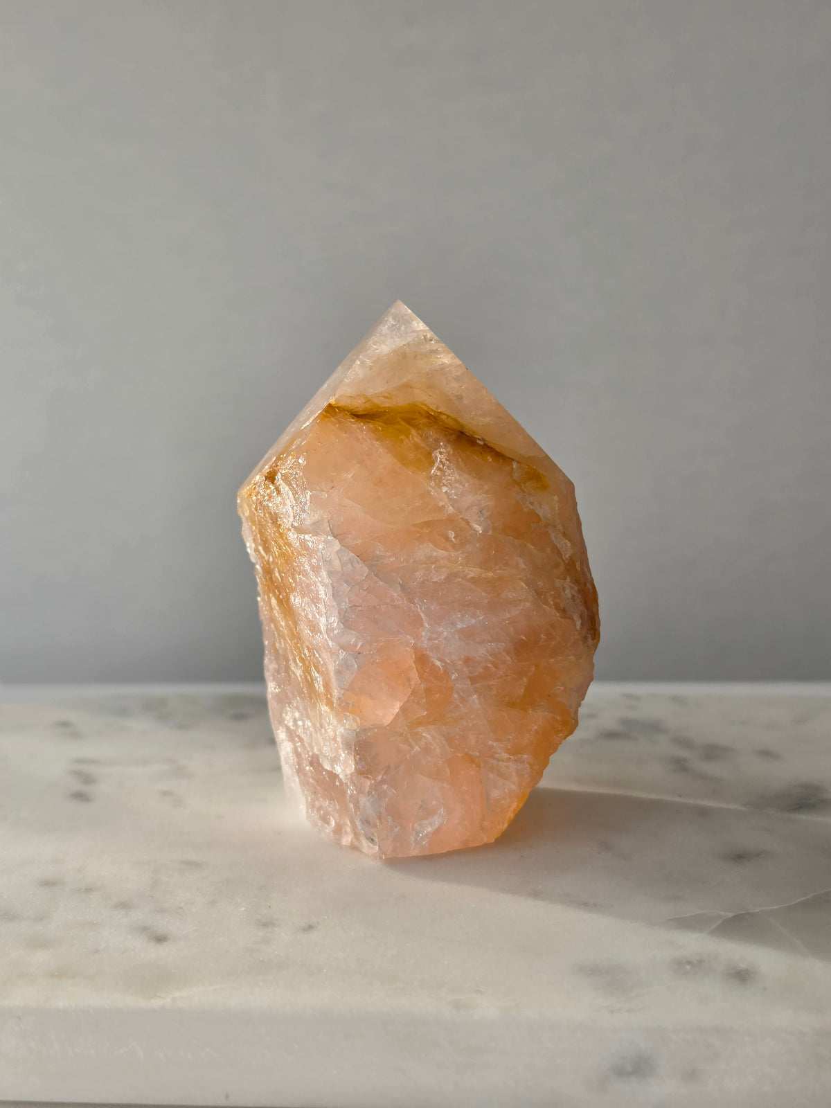 Chunky Rose Quartz and Golden Healer Quartz tower with soft blush pink colouring, warm golden inclusions and a combination of raw crystal texture and polished surfaces