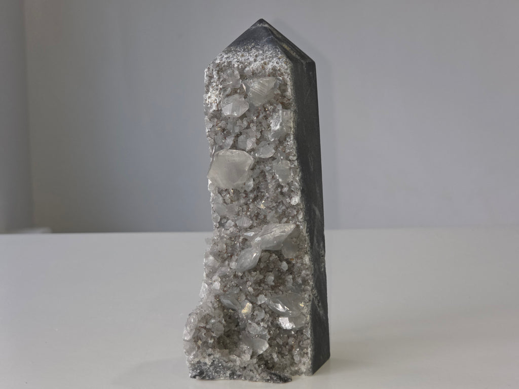 Luxury Sphalerite with Calcite Tower by Stone and Bloom featuring smoky bronze tones and luminous crystal formations, on trend, Statement Peice, Home Styling
