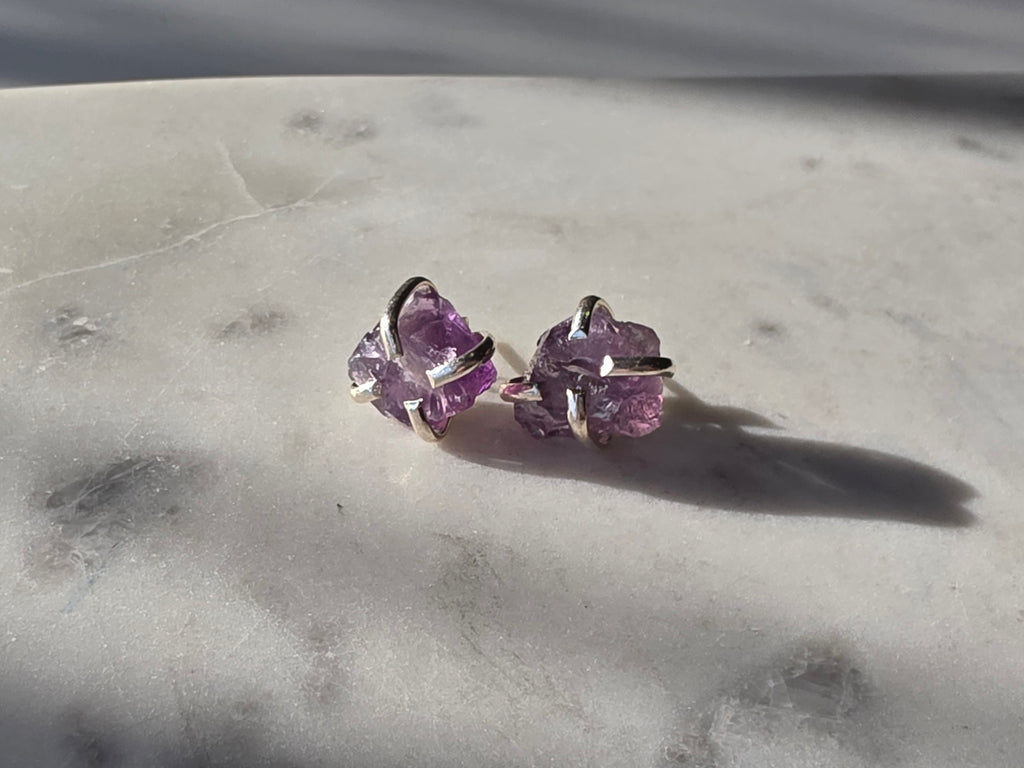 Natural raw Amethyst crystal stud earrings in a four-claw silver setting, Raw Luxe Collection