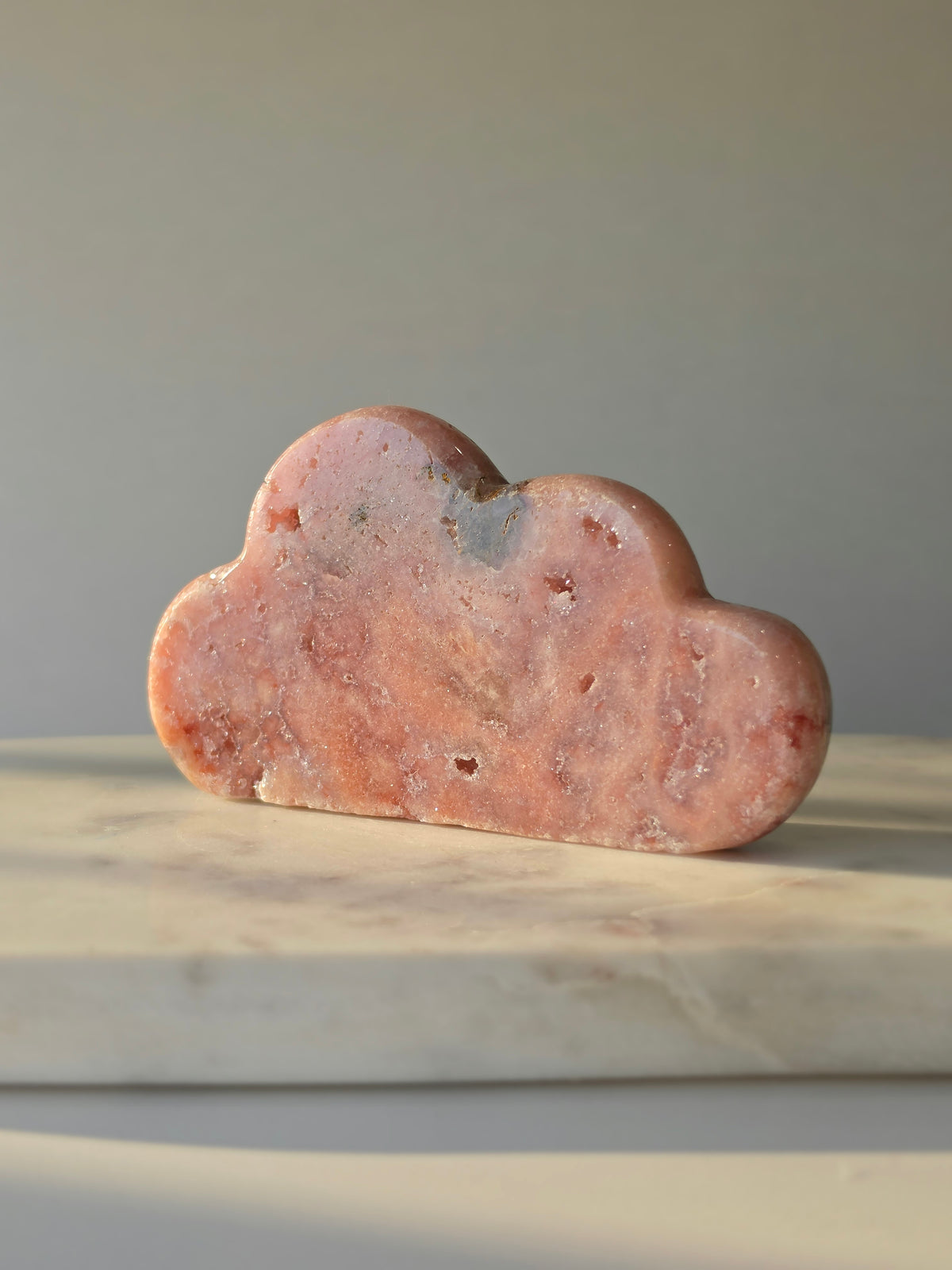 Natural Brazilian Pink Amethyst Cloud with soft blush pink and peach tones, subtle mineral inclusions and organic sculptural shape
