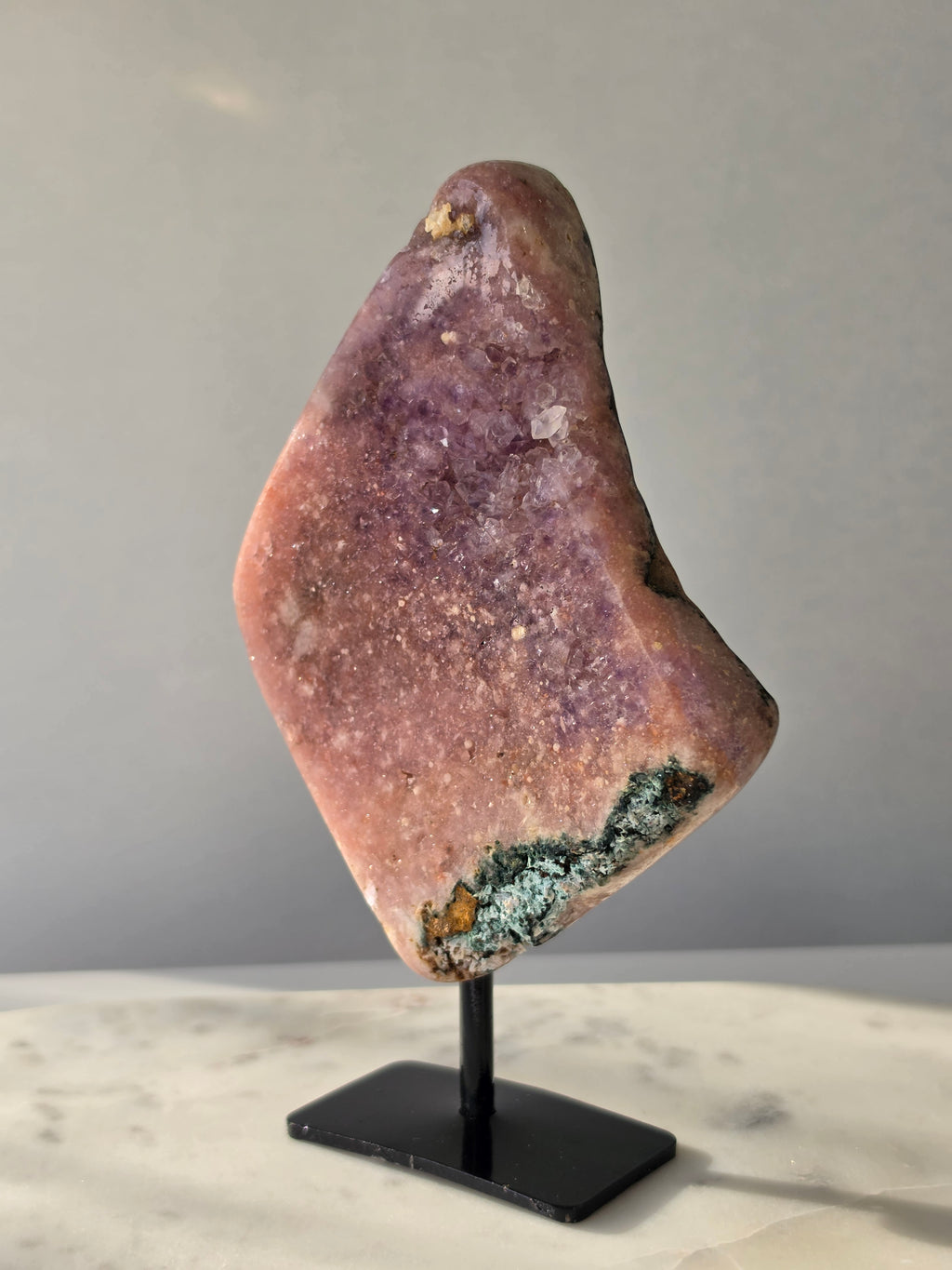 Brazilian Pink Amethyst slab on display stand with rich pink and purple colouring, sparkling purple and pink druzy and natural Jasper inclusions, 645g and 18.5cm