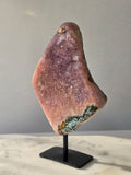 Brazilian Pink Amethyst slab on display stand with rich pink and purple colouring, sparkling purple and pink druzy and natural Jasper inclusions, 645g and 18.5cm