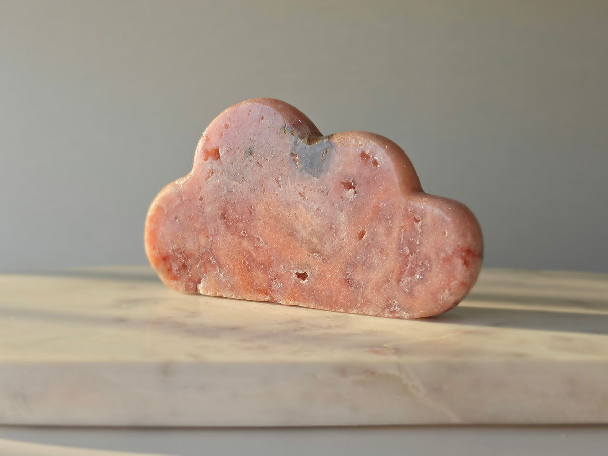 Natural Brazilian Pink Amethyst Cloud with soft blush pink and peach tones, subtle mineral inclusions and organic sculptural shape