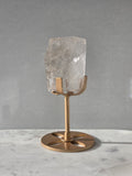 Clear Quartz freeform crystal with subtle smoky-grey translucence, natural internal inclusions and luminous clarity, displayed on an elegant gold-finished stand.