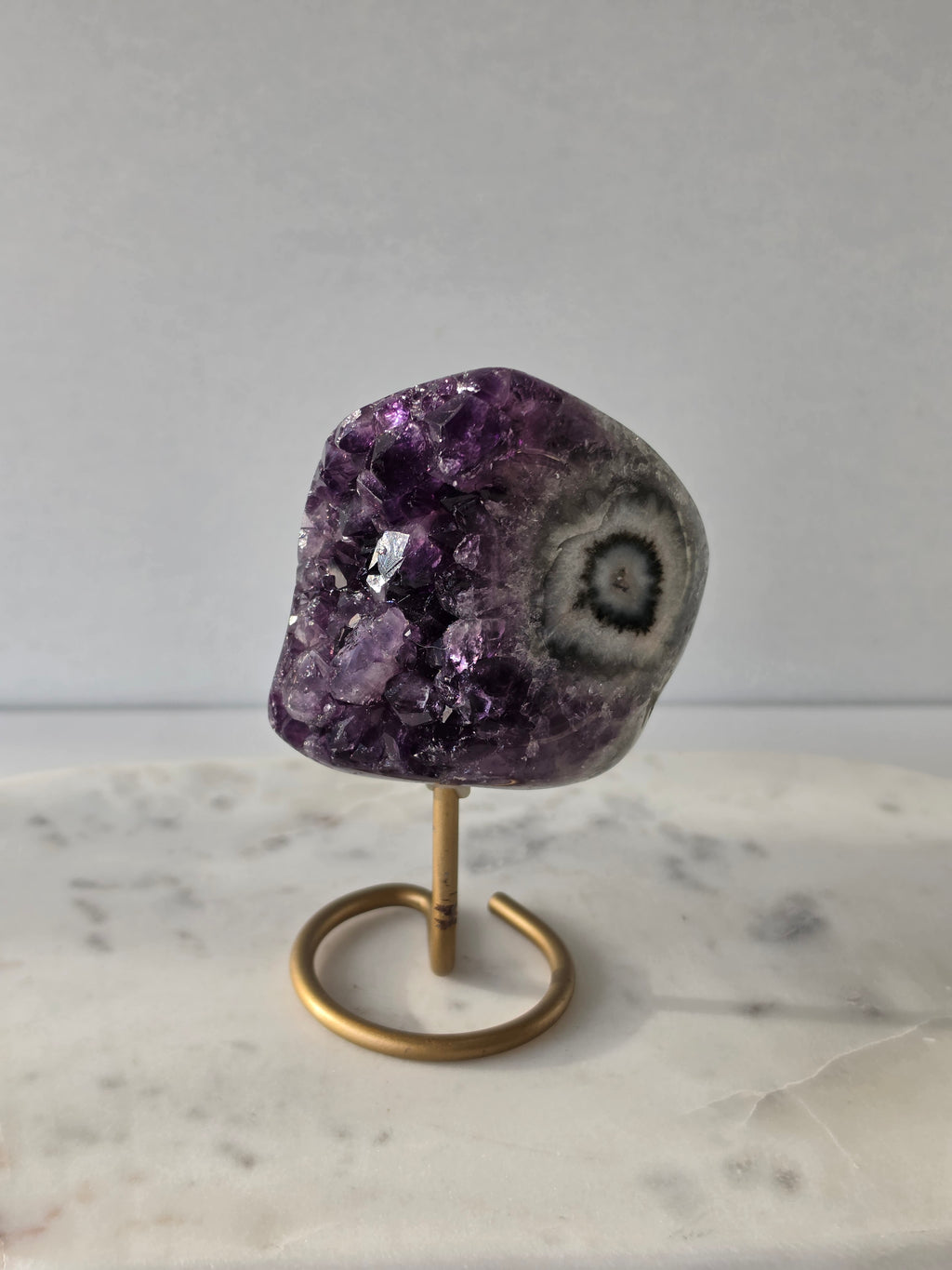 Natural Deep Purple Amethyst Stalactite on a gold display stand