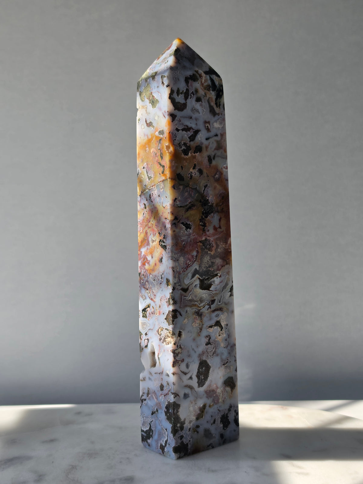 21.5cm Orbicular Ocean Jasper weighing 594g with translucent jelly-like pockets, sparkling druzy formations and intricate natural orbicular patterns