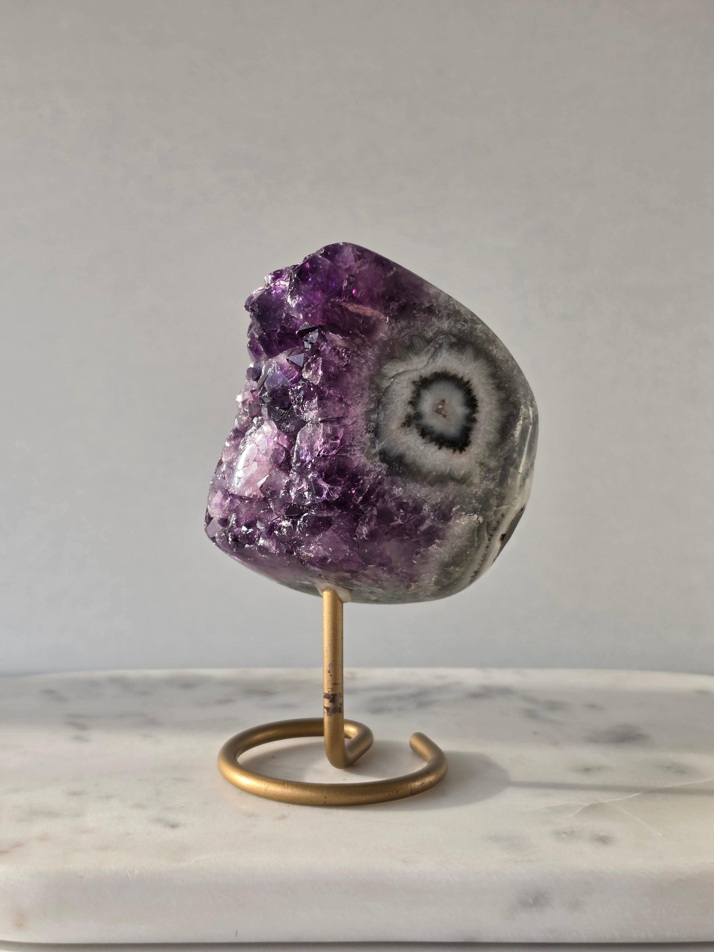 Natural Deep Purple Amethyst Stalactite on a gold display stand