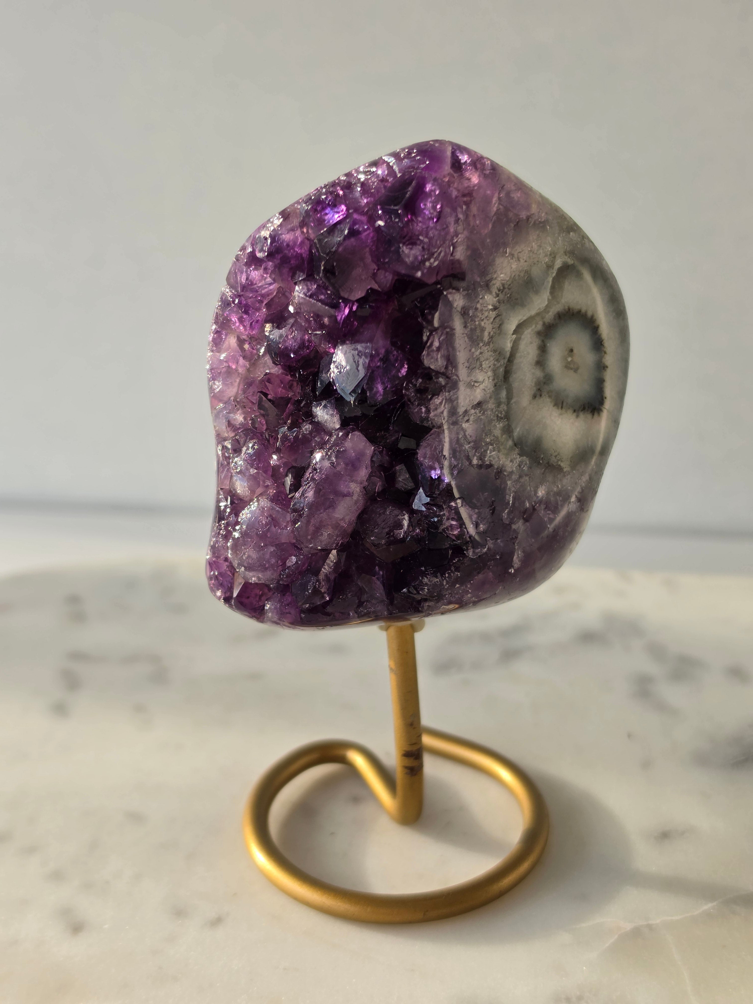 Natural Deep Purple Amethyst Stalactite on a gold display stand