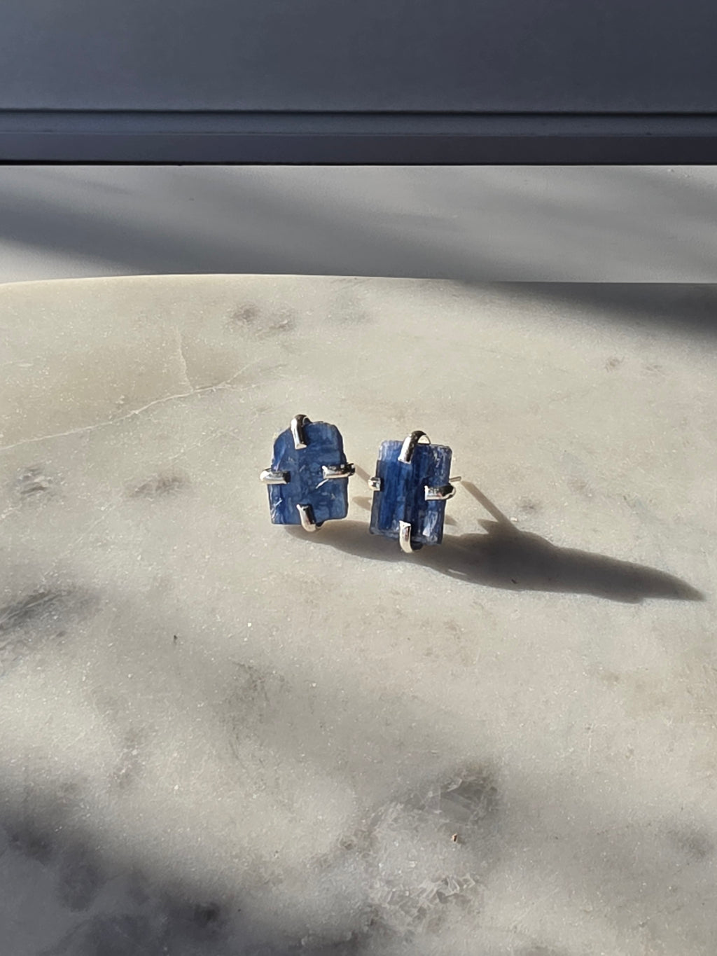 Natural raw Blue Kyanite crystal stud earrings in a four-claw silver setting, Raw Luxe Collection