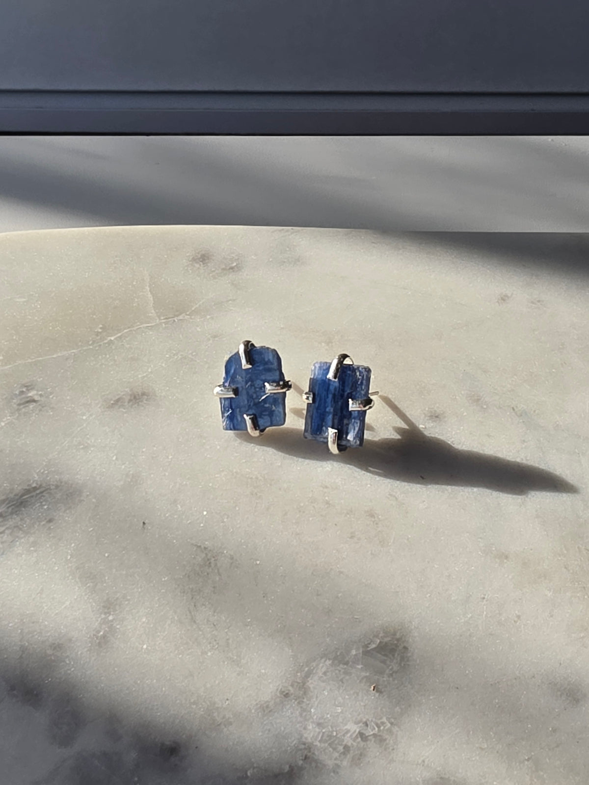 Natural raw Blue Kyanite crystal stud earrings in a four-claw silver setting, Raw Luxe Collection