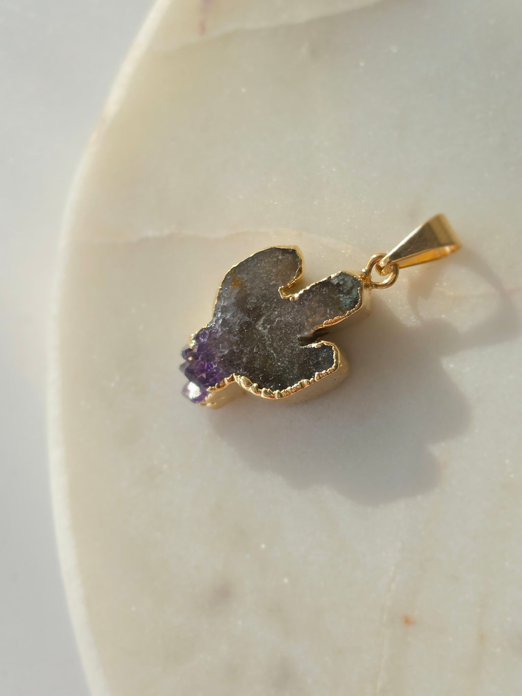 Amethyst and agate cactus slice pendant featuring deep smoky-grey agate, purple crystal formations and a 24K gold-plated outline.
