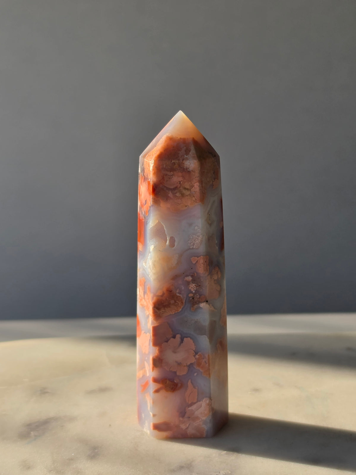 Cotton Candy Agate point with natural pink peach and blue-grey flower-like plume formations
