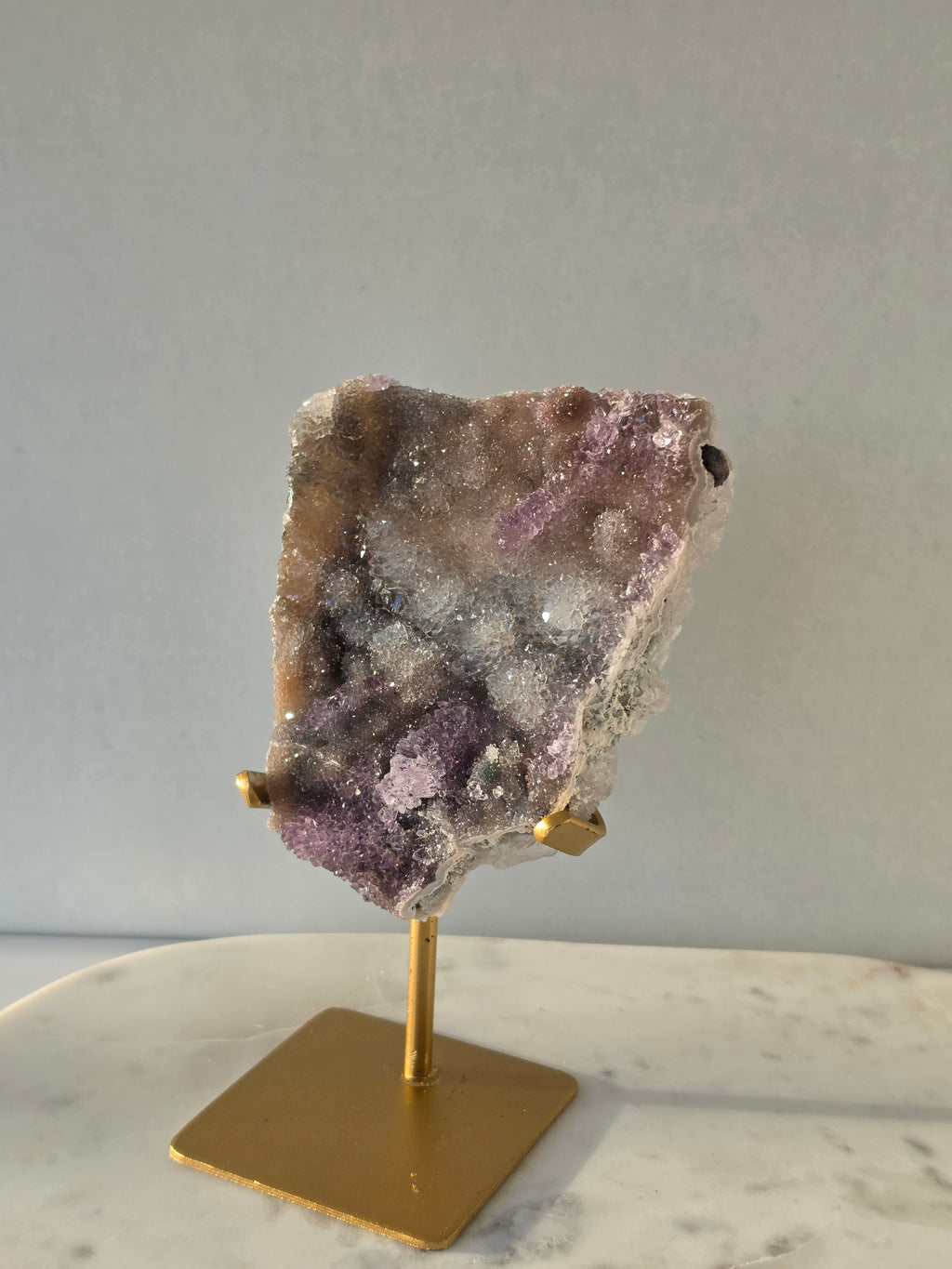 Luxury Brazilian Zeolite Amethyst Flower on matte gold stand with sparkling lavender druzy Amethyst crystals, premium natural statement crystal for elegant home décor by Stone & Bloom.