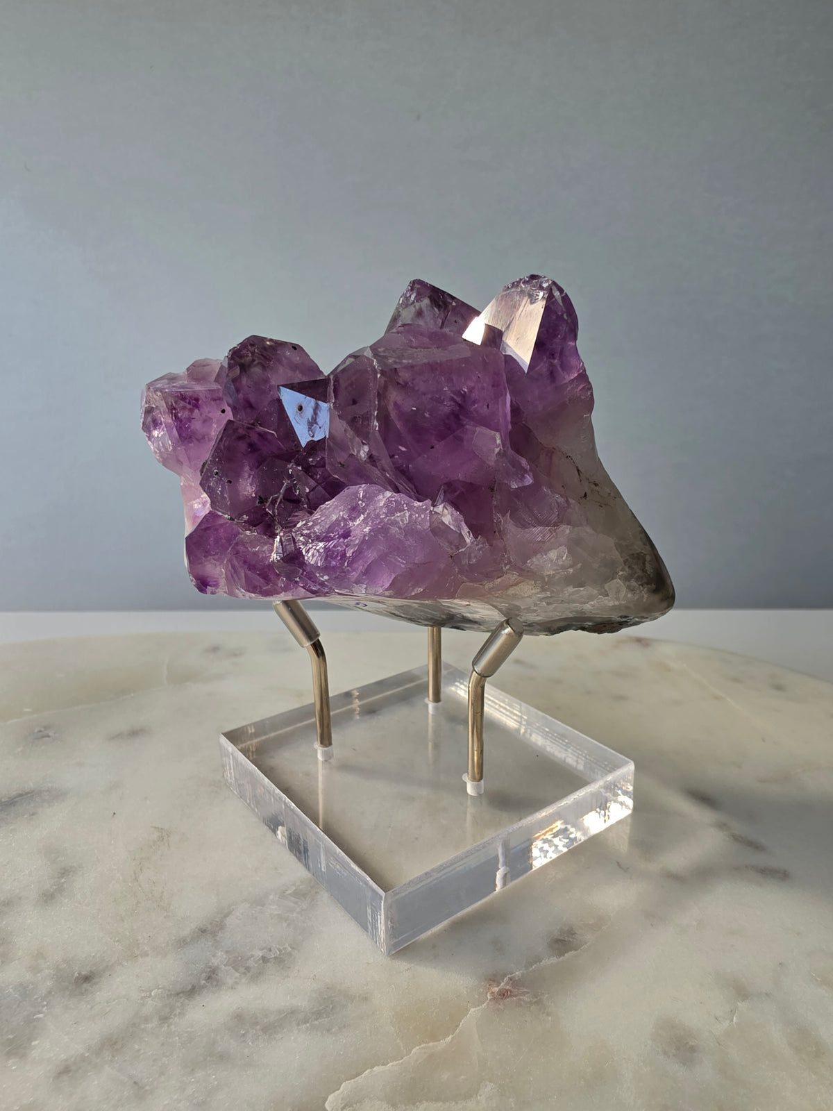 Intense purple Amethyst polished freeform with raw chunky crystal formations and natural Goethite and Hematite inclusions