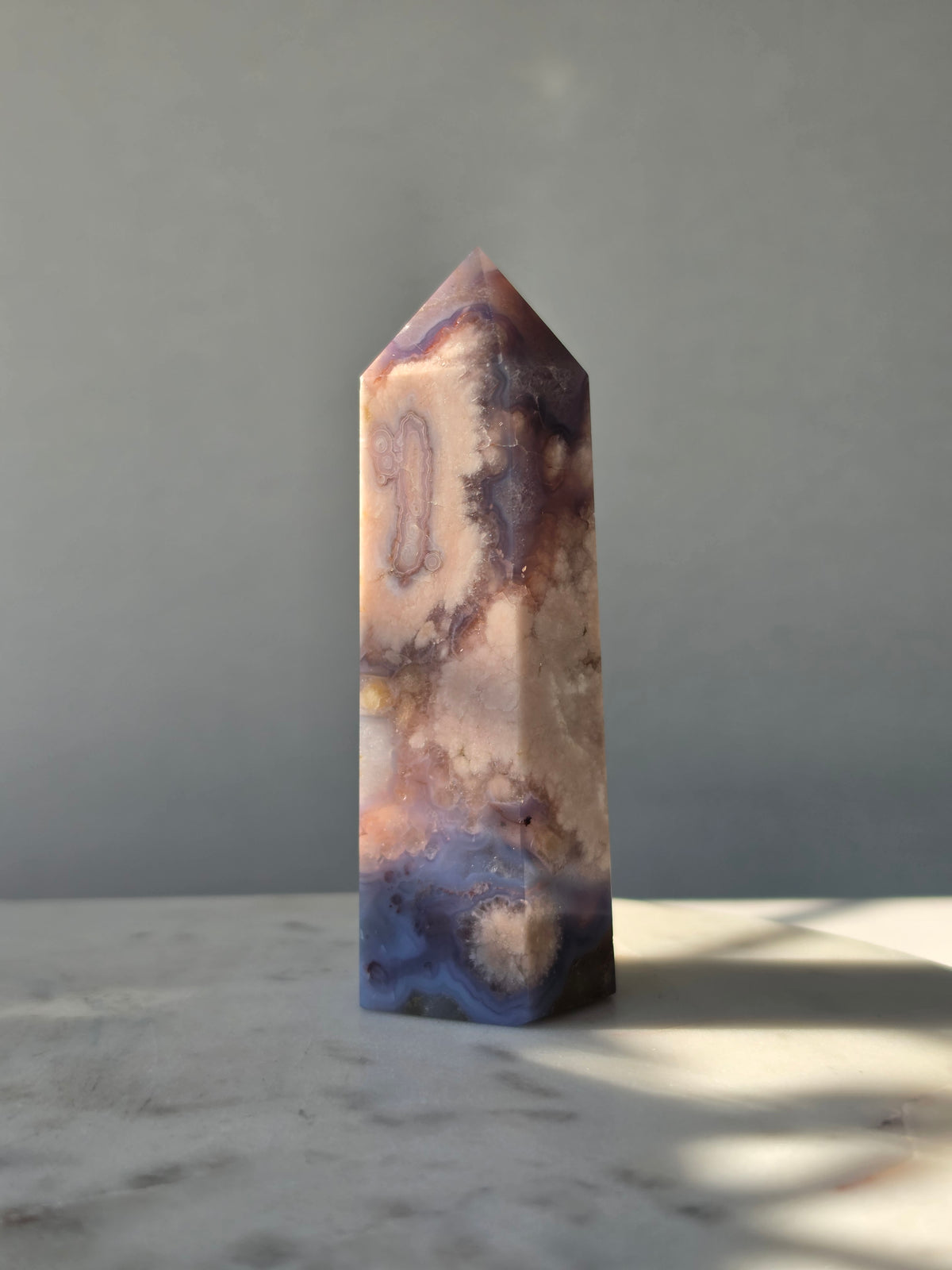 Blue Flower Agate crystal point with soft blue, lavender and cream tones and natural flower-like plume inclusions