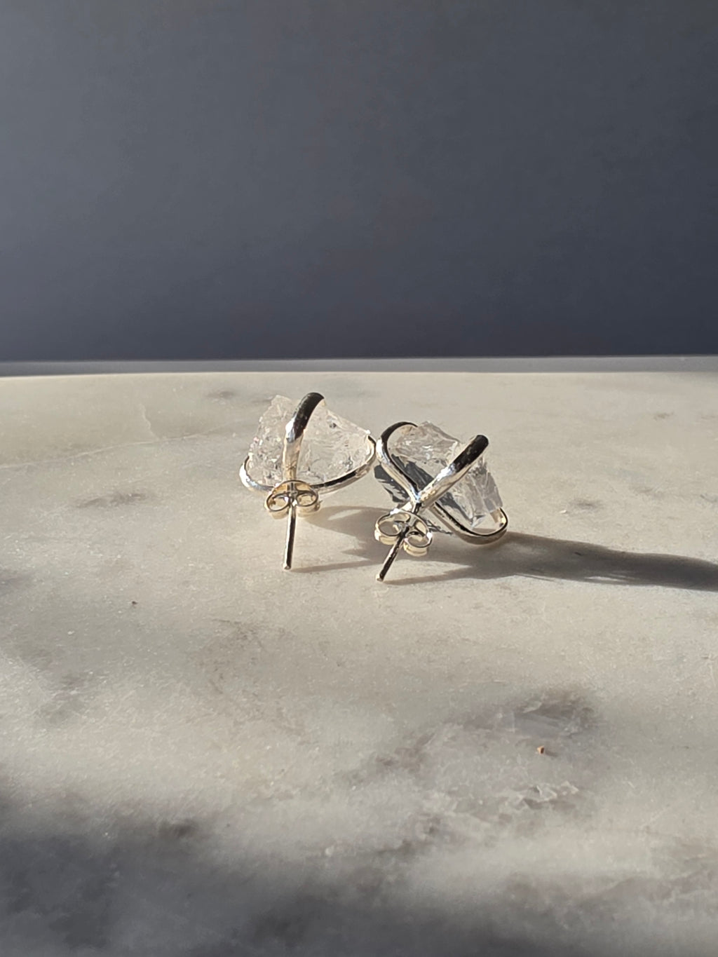 Natural raw Clear Quartz crystal stud earrings in a four-claw silver-plated setting, Raw Luxe Collection