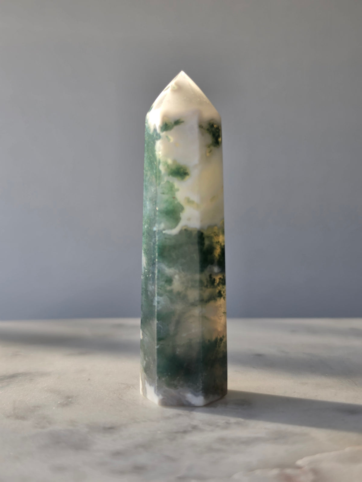 Moss Agate crystal point with translucent milky quartz and intricate forest green botanical inclusions