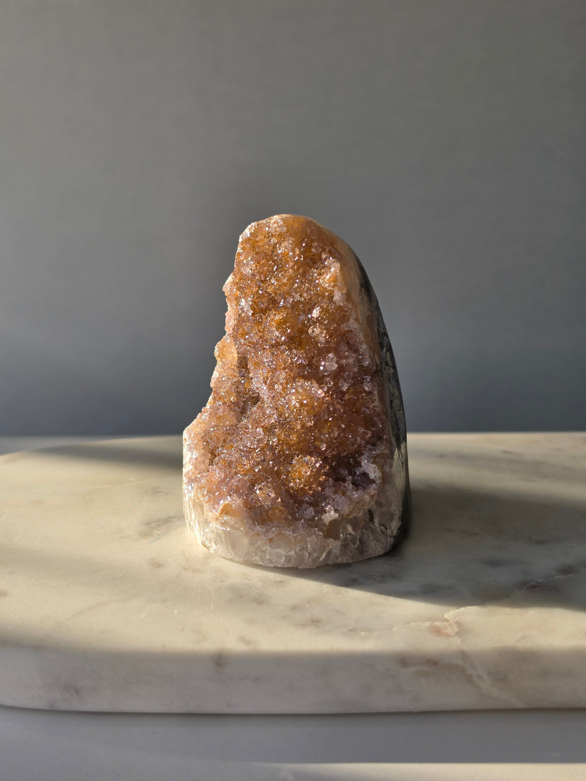 Druzy Golden Amethyst cut base from Uruguay with intensely sparkling crystal druzy surface and warm golden lilac and pink tones 482g 10cm