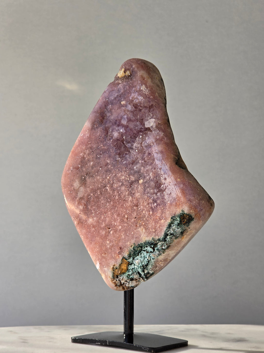 Brazilian Pink Amethyst slab on display stand with rich pink and purple colouring, sparkling purple and pink druzy and natural Jasper inclusions, 645g and 18.5cm