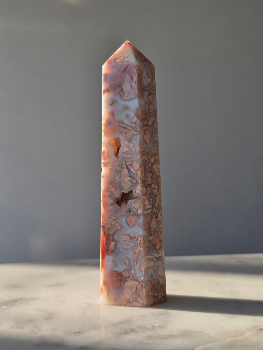 Cotton Candy Agate point with natural pink peach and white-grey flower-like plume formations
