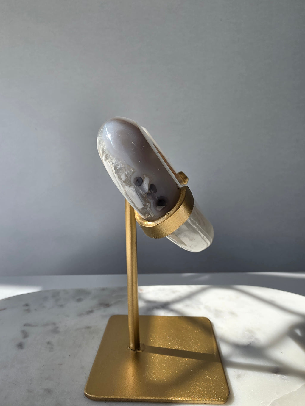 High Clarity Druzy Agate Geode Heart on a gold stand featuring sparkling druzy quartz crystals and natural champagne, caramel, ivory, taupe and smoky-grey agate banding.