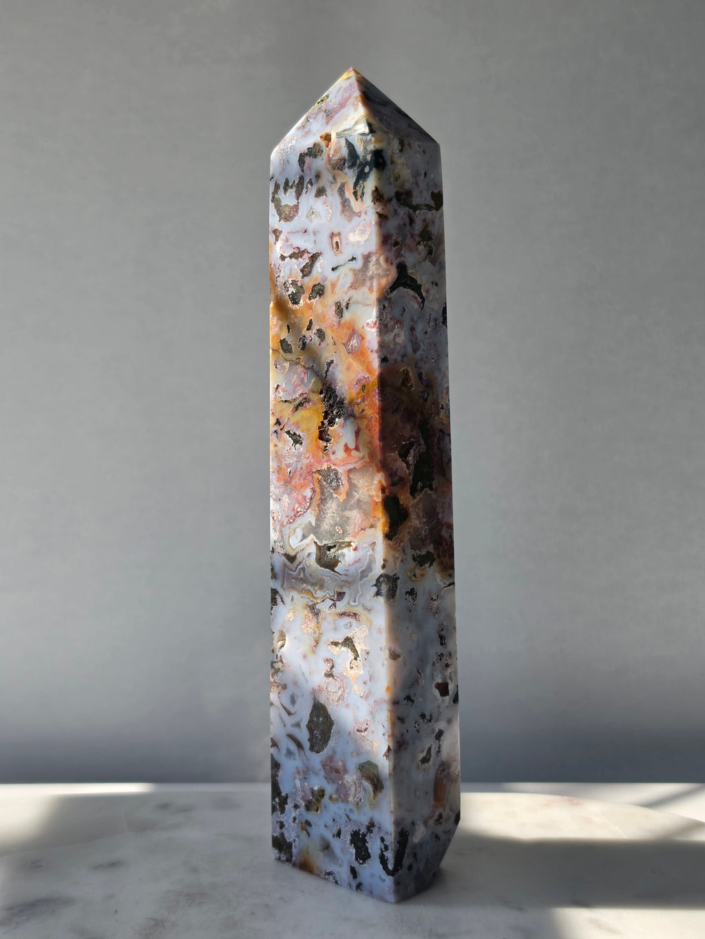 21.5cm Orbicular Ocean Jasper weighing 594g with translucent jelly-like pockets, sparkling druzy formations and intricate natural orbicular patterns