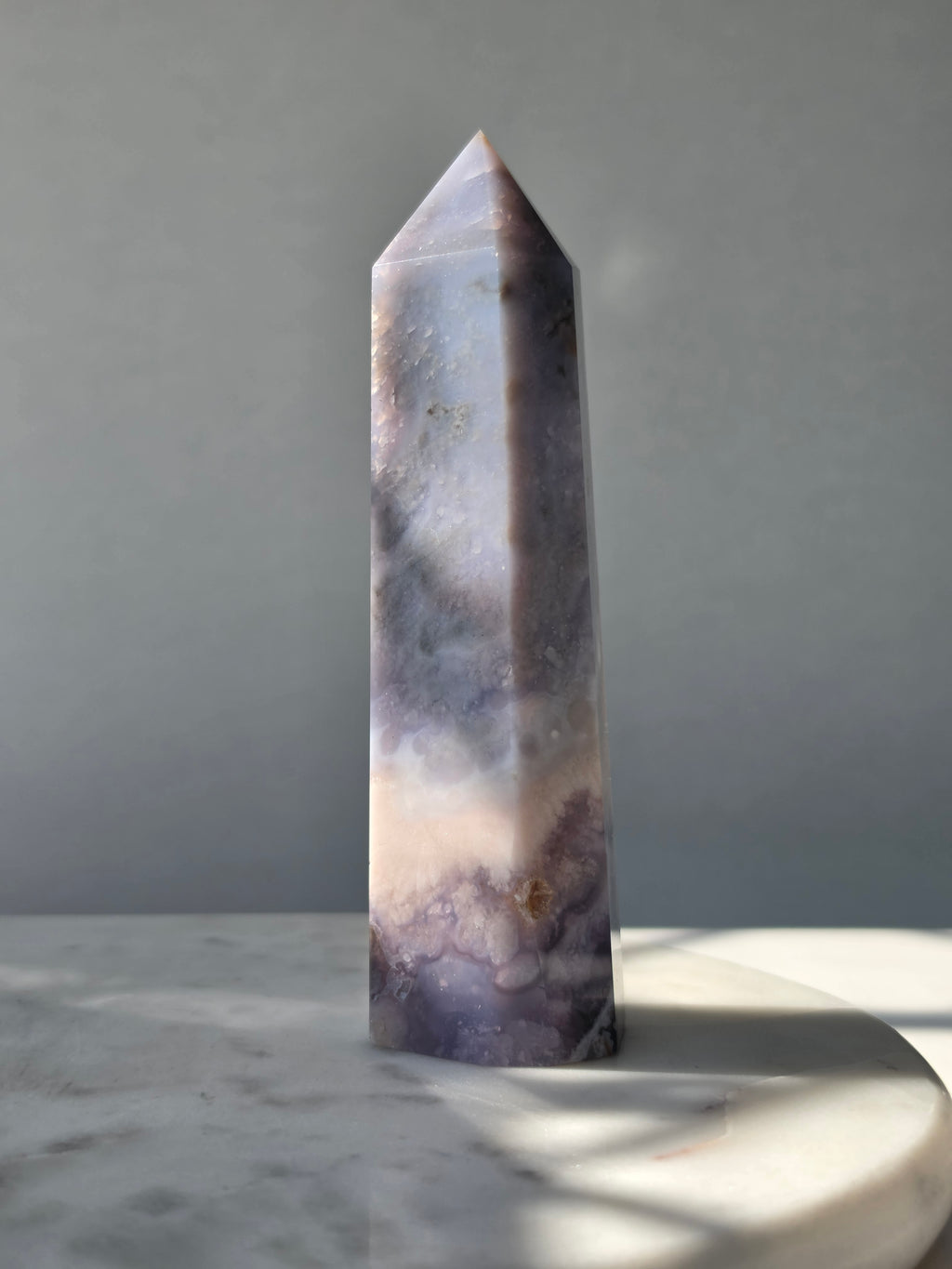 Blue Flower Agate crystal point with soft blue, lavender and cream tones and natural flower-like plume inclusions