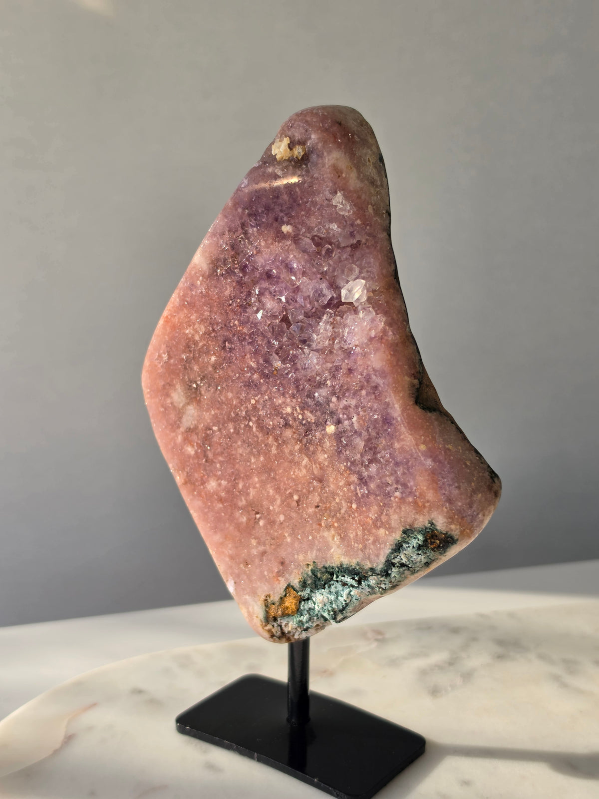 Brazilian Pink Amethyst slab on display stand with rich pink and purple colouring, sparkling purple and pink druzy and natural Jasper inclusions, 645g and 18.5cm