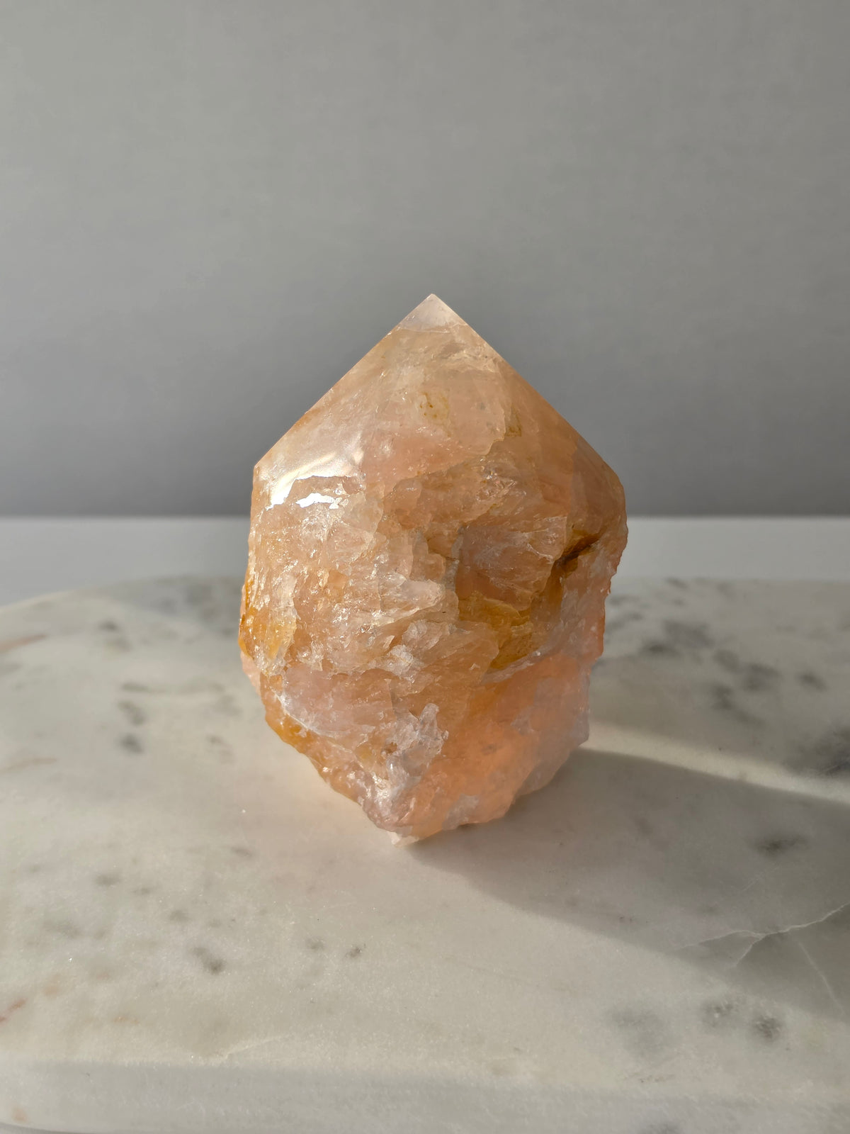 Chunky Rose Quartz and Golden Healer Quartz tower with soft blush pink colouring, warm golden inclusions and a combination of raw crystal texture and polished surfaces