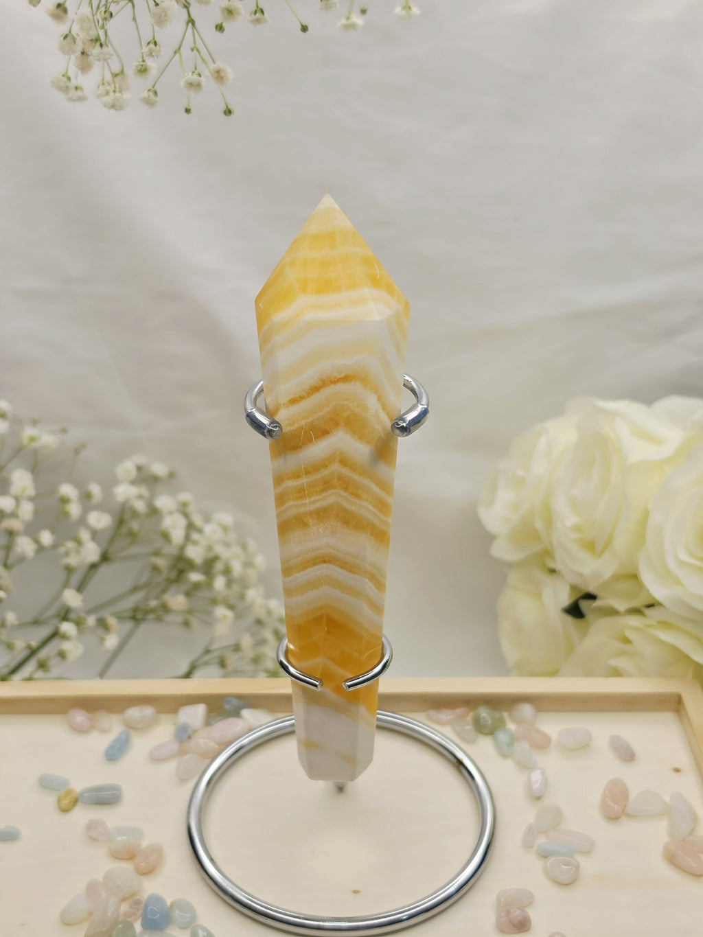 Luxury Yellow Banded Calcite Wand by Stone and Bloom featuring warm golden and cream natural banding, on trend