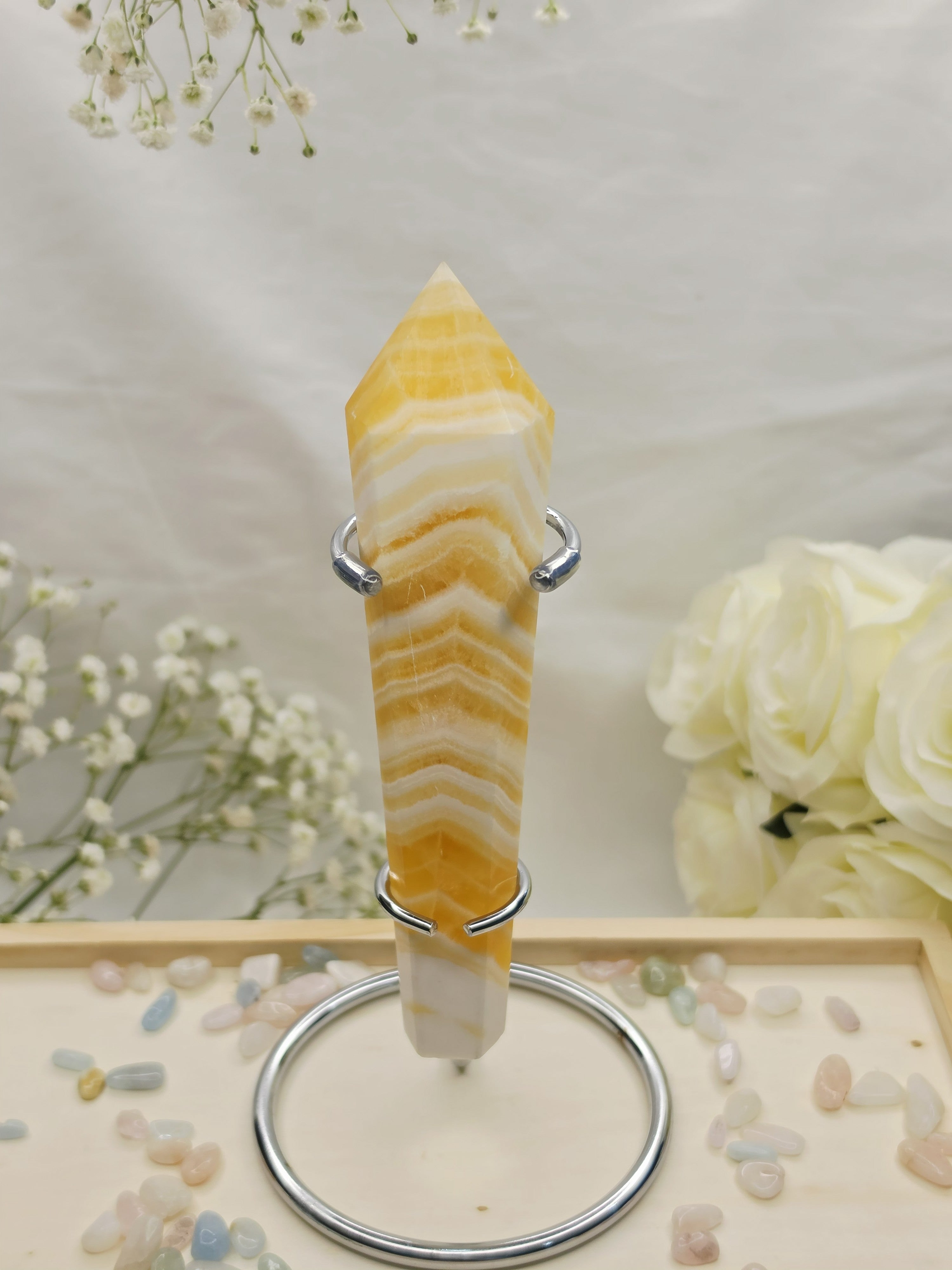 Luxury Yellow Banded Calcite Wand by Stone and Bloom featuring warm golden and cream natural banding, on trend